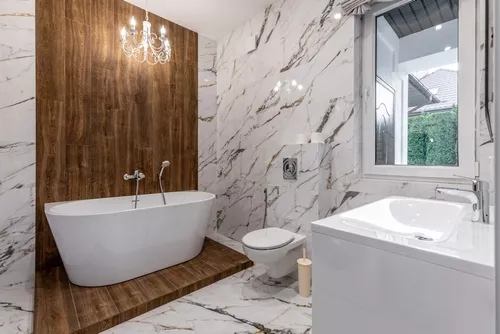 One-Day Bathroom wet-area replacement with new wall panels, shower base and glass enclosure